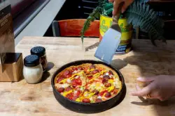 A hot dog on your deep dish? Lou Malnati's and Portillo's pair up for Chicago Dog Deep Dish