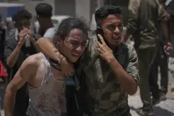 Nearly 100 people killed seeking aid in Gaza on Sunday, Palestinian officials say