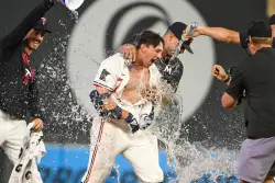 After long rain delay, Twins rally for walk-off victory over Red Sox